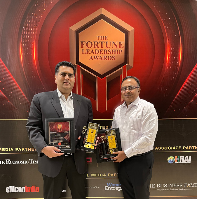 Picture of Dr Nitin Jain with Dr Rishabh Bhandari while receiving The Fortune Leadership Award for AI Implementation in Clinical Setting